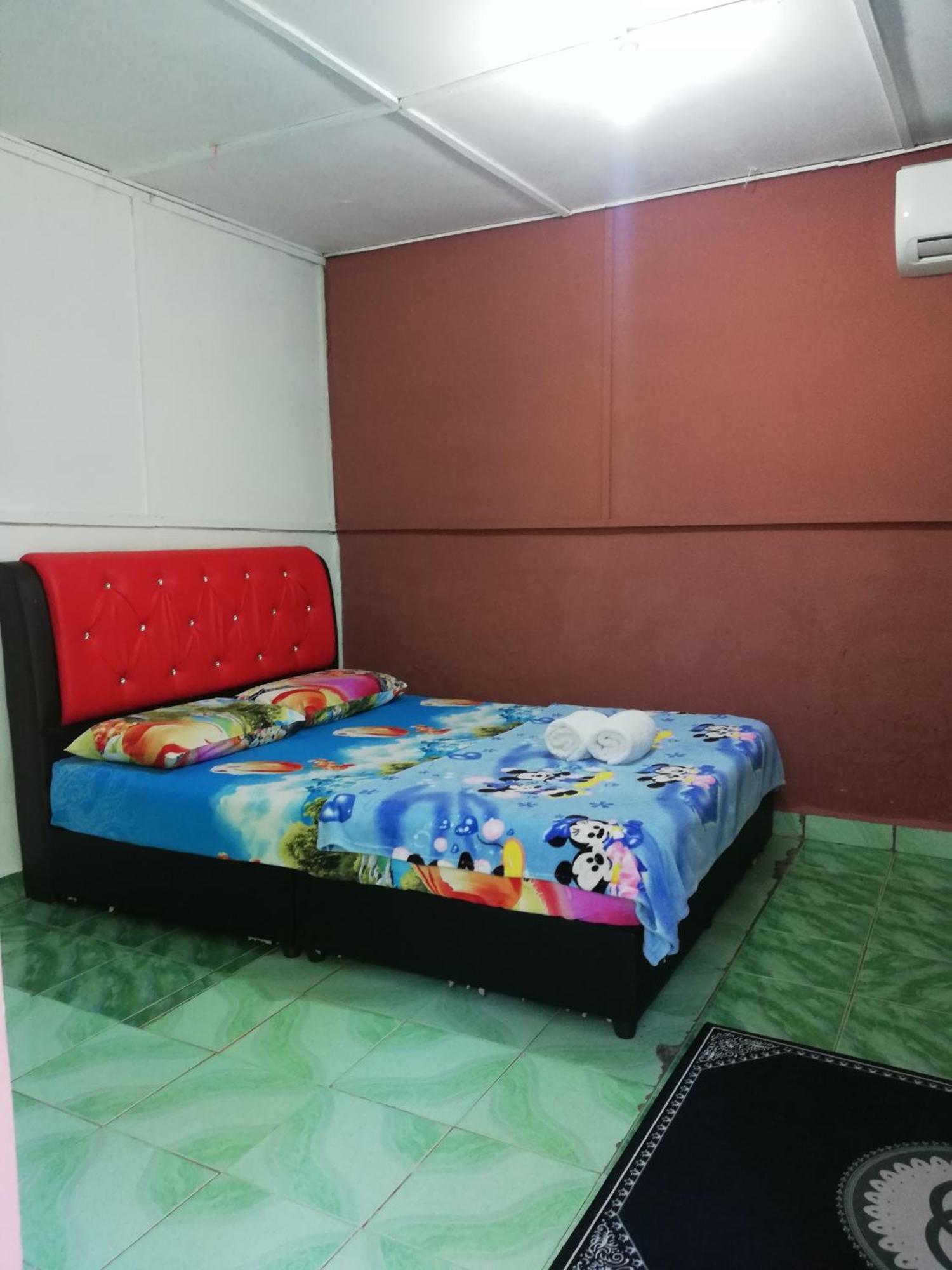 Durian Chalet 쿠알라타한 객실 사진